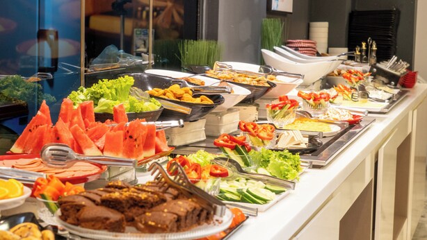 A buffet with various food items including salads, fruits, and desserts. - The Biancho Hotel Pera (Istanbul)