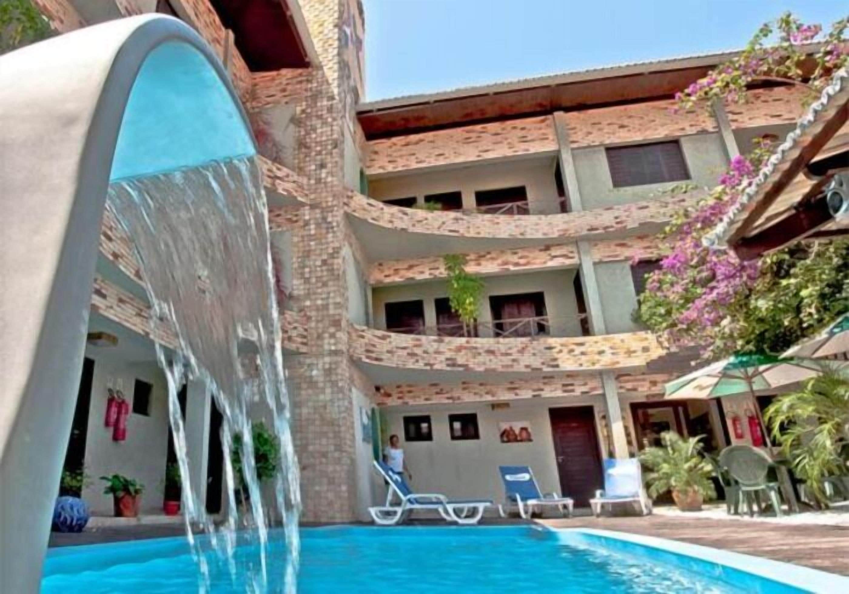 Outdoor pool, open 9:00 AM to 9:00 PM, pool umbrellas, sun loungers