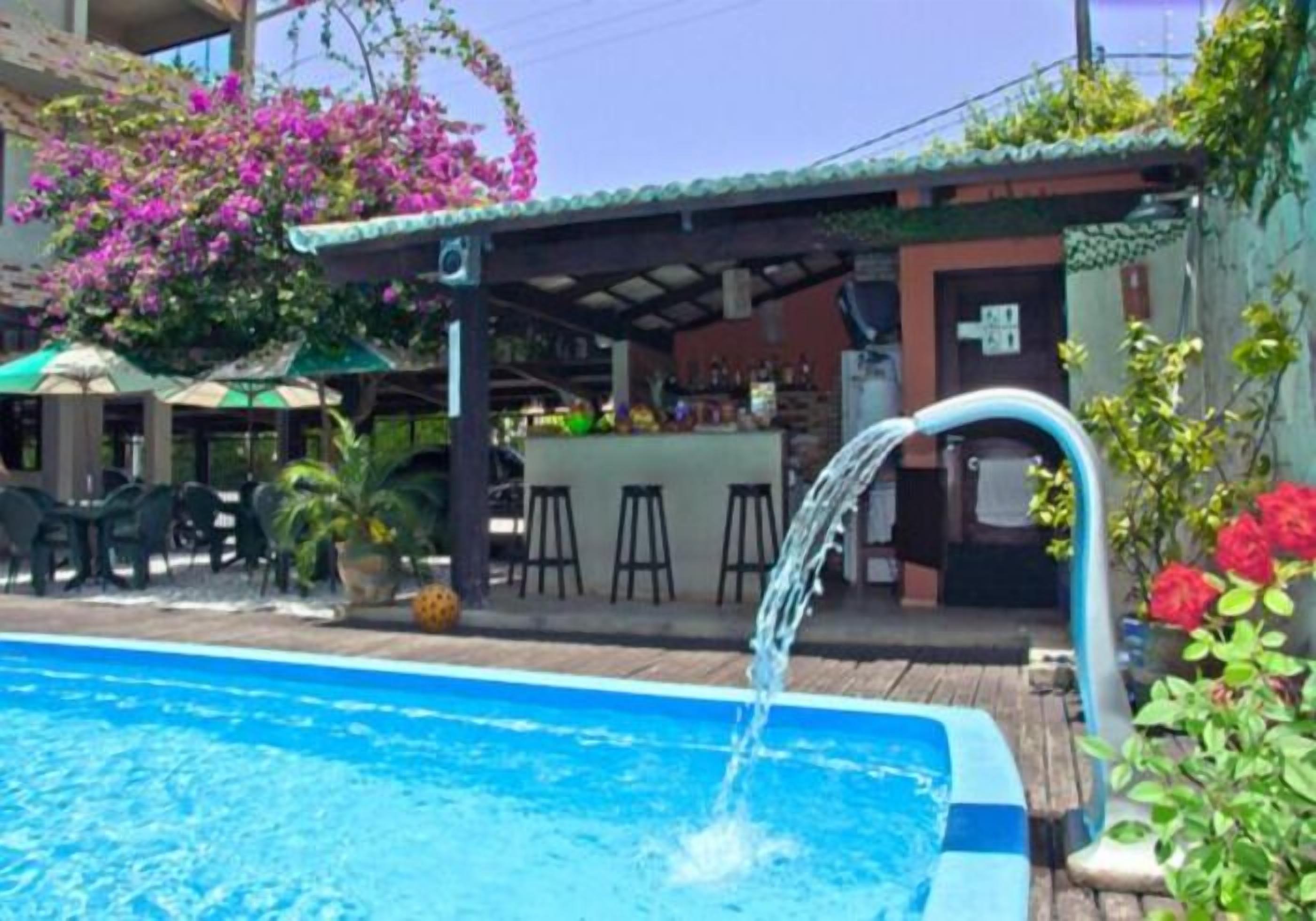 Outdoor pool, open 9:00 AM to 9:00 PM, pool umbrellas, pool loungers