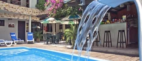Outdoor pool, open 9:00 AM to 9:00 PM, pool umbrellas, sun loungers