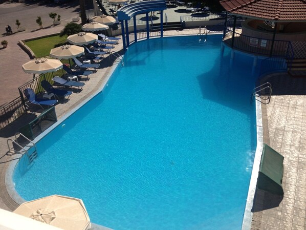 Outdoor pool, pool umbrellas, pool loungers