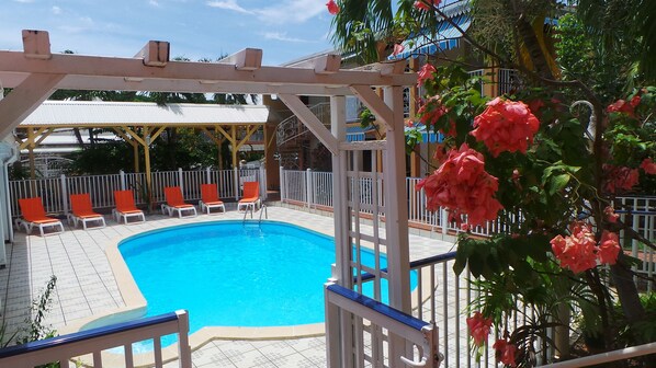 Outdoor pool, pool umbrellas, pool loungers