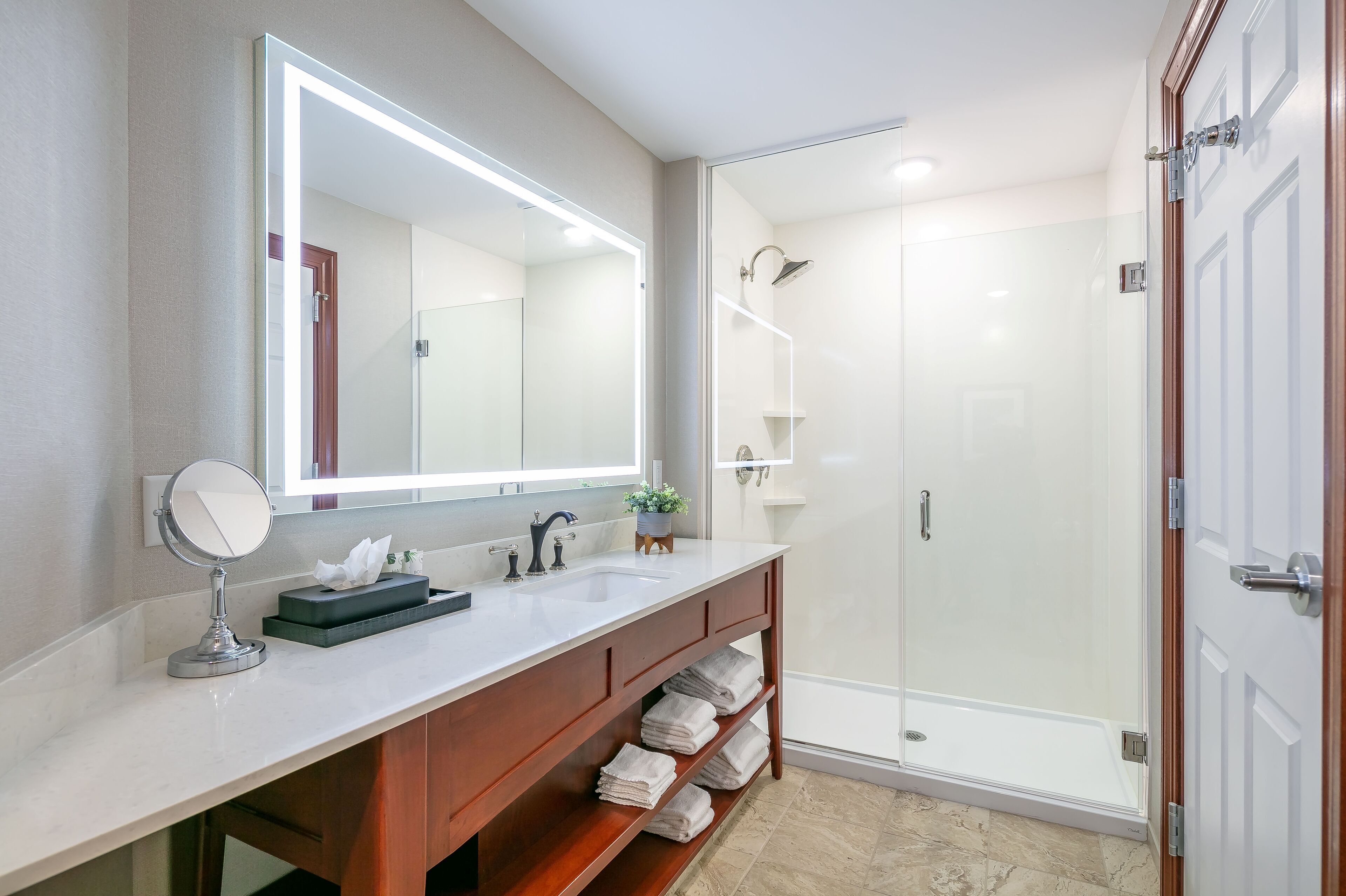 rainfall showerhead, designer toiletries, hair dryer, towels