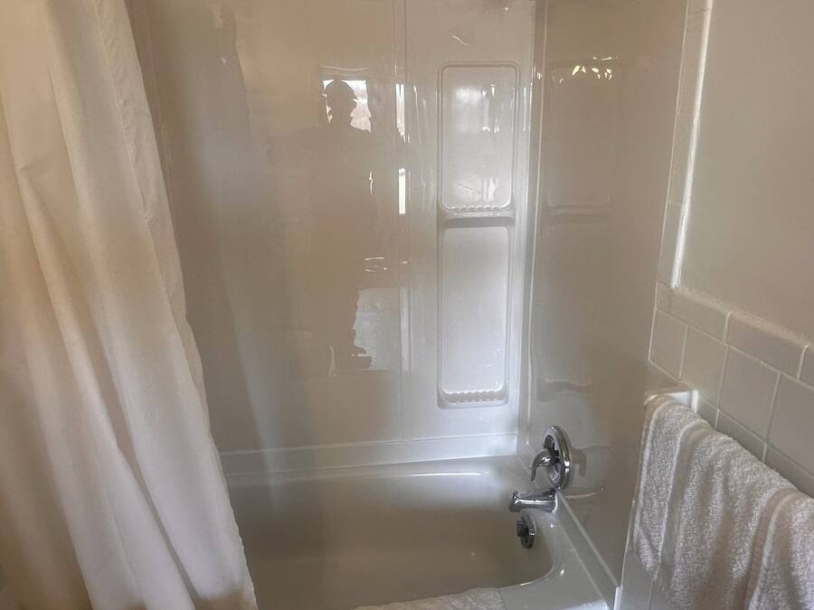 Standard Room, 2 Queen Beds | Bathroom | Combined shower/tub, free toiletries, hair dryer, towels