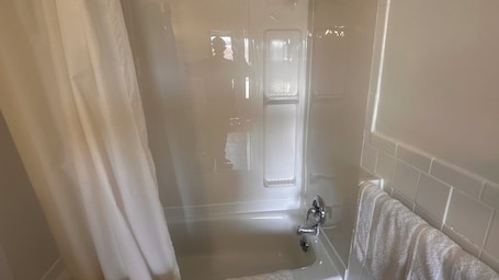 Standard Room, 2 Queen Beds | Bathroom | Combined shower/tub, free toiletries, hair dryer, towels. Colonial Motel