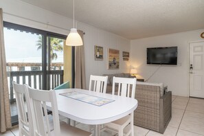 Superior Condo, 1 King Bed with Sofa bed, Balcony, Partial Ocean View | Living area | 24-inch TV with cable channels - The Tiki (South Padre Island)