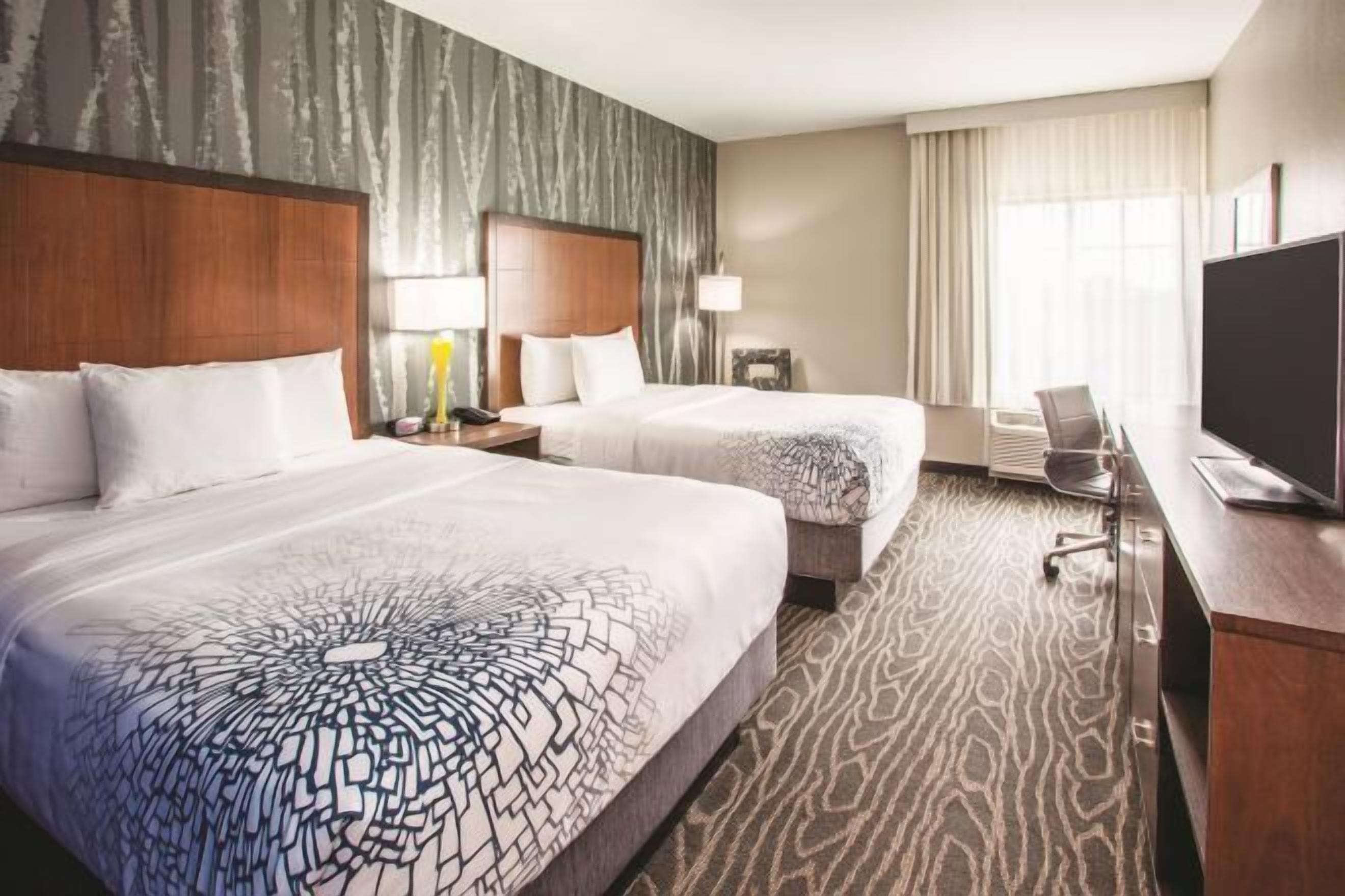 Premium bedding, down comforters, pillowtop beds, desk