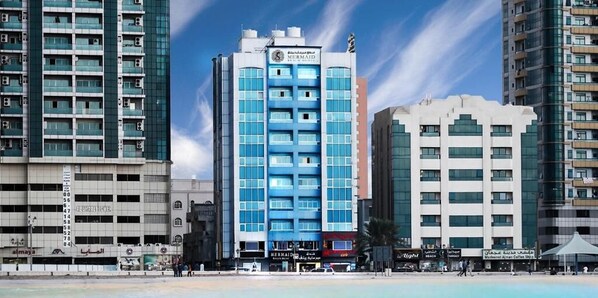 Family Room, 2 Bedrooms, Partial Sea View | 1 bedroom, in-room safe, desk, iron/ironing board