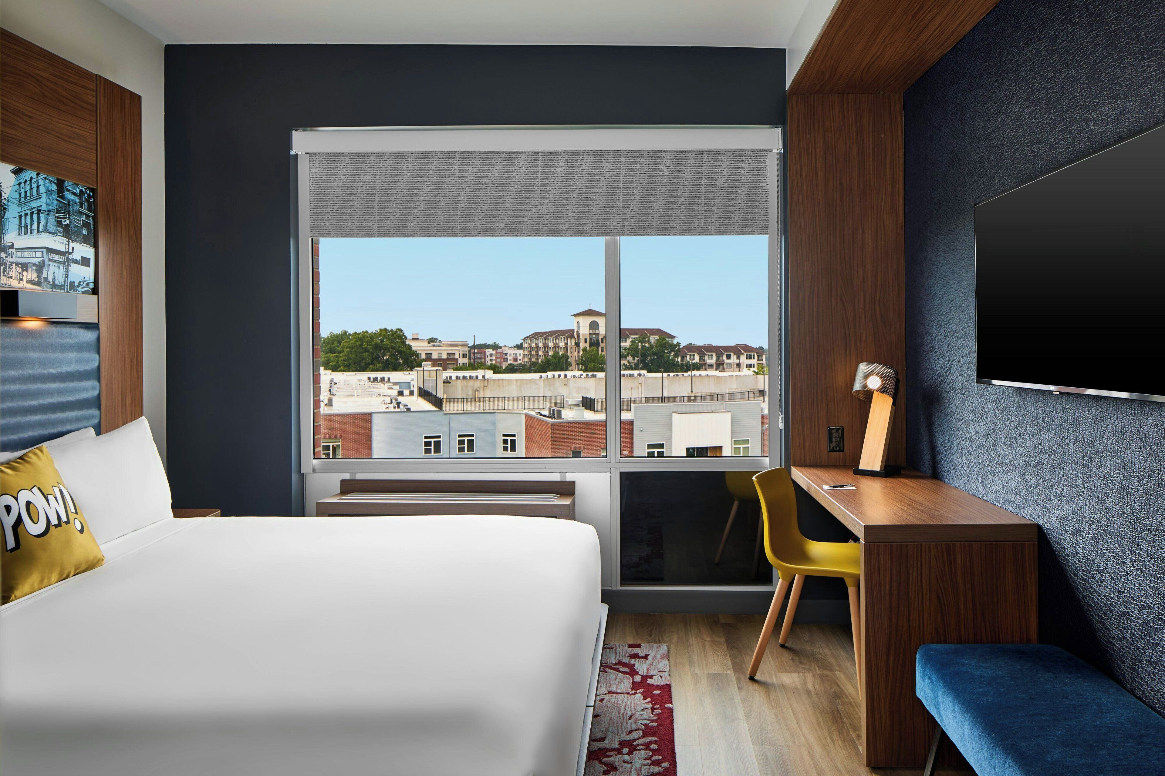 hypo-allergenic bedding, down duvets, in-room safe, desk