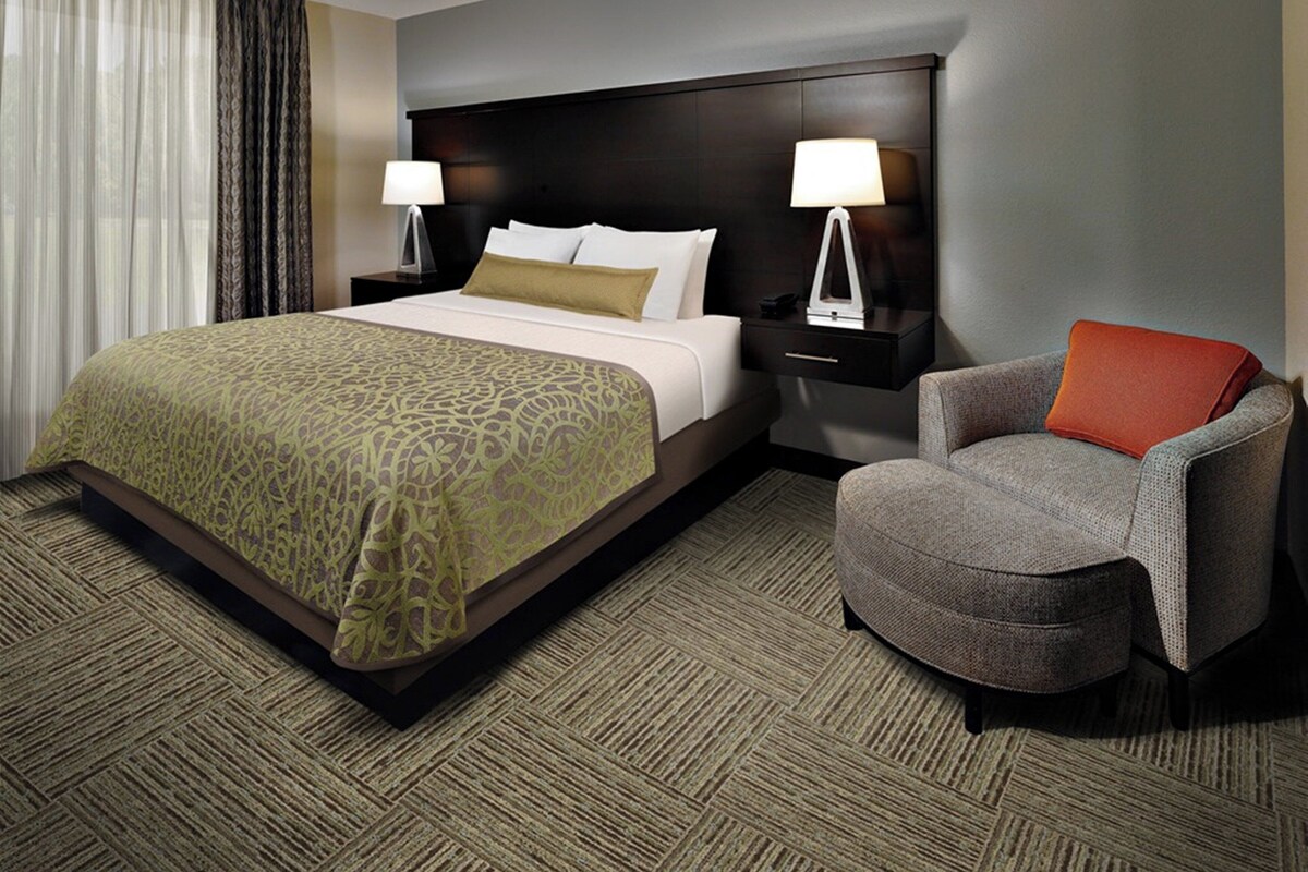 Premium bedding, desk, laptop workspace, iron/ironing board
