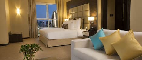 Suite Deluxe, vista a la ciudad | Ropa de cama de alta calidad y minibar