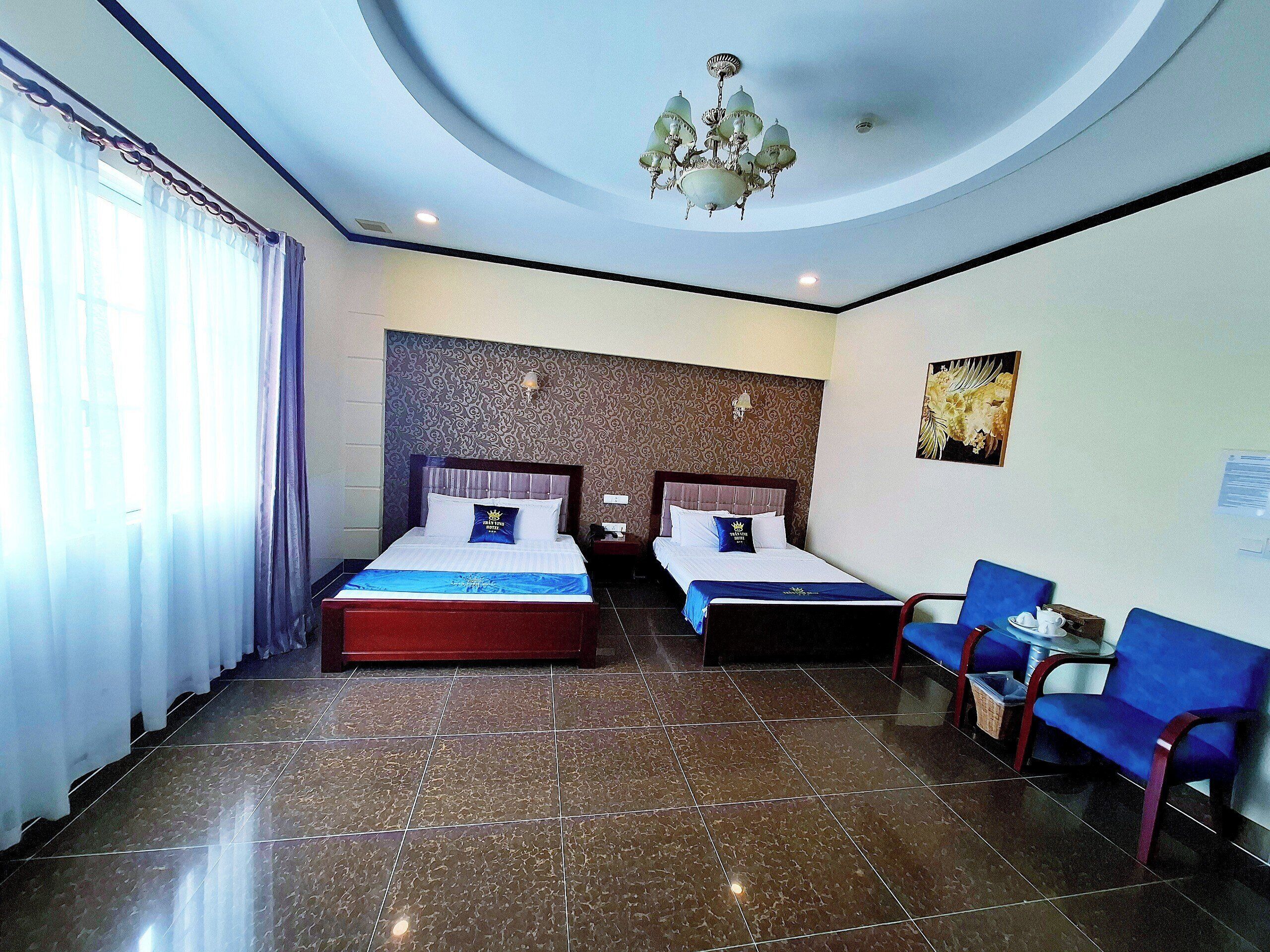 Deluxe Family Room | Minibar, cribs/infant beds, free WiFi