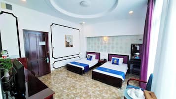 Quarto casal ou duplo superior, vista para a cidade | Frigobar, berços (sobretaxa), Wi-Fi de cortesia