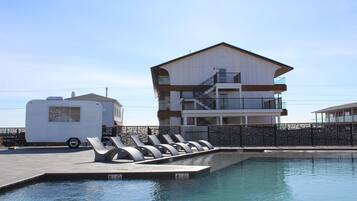 2 outdoor pools, pool umbrellas, sun loungers