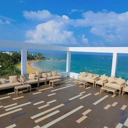 Relax on the furnished terrace with breathtaking ocean views.