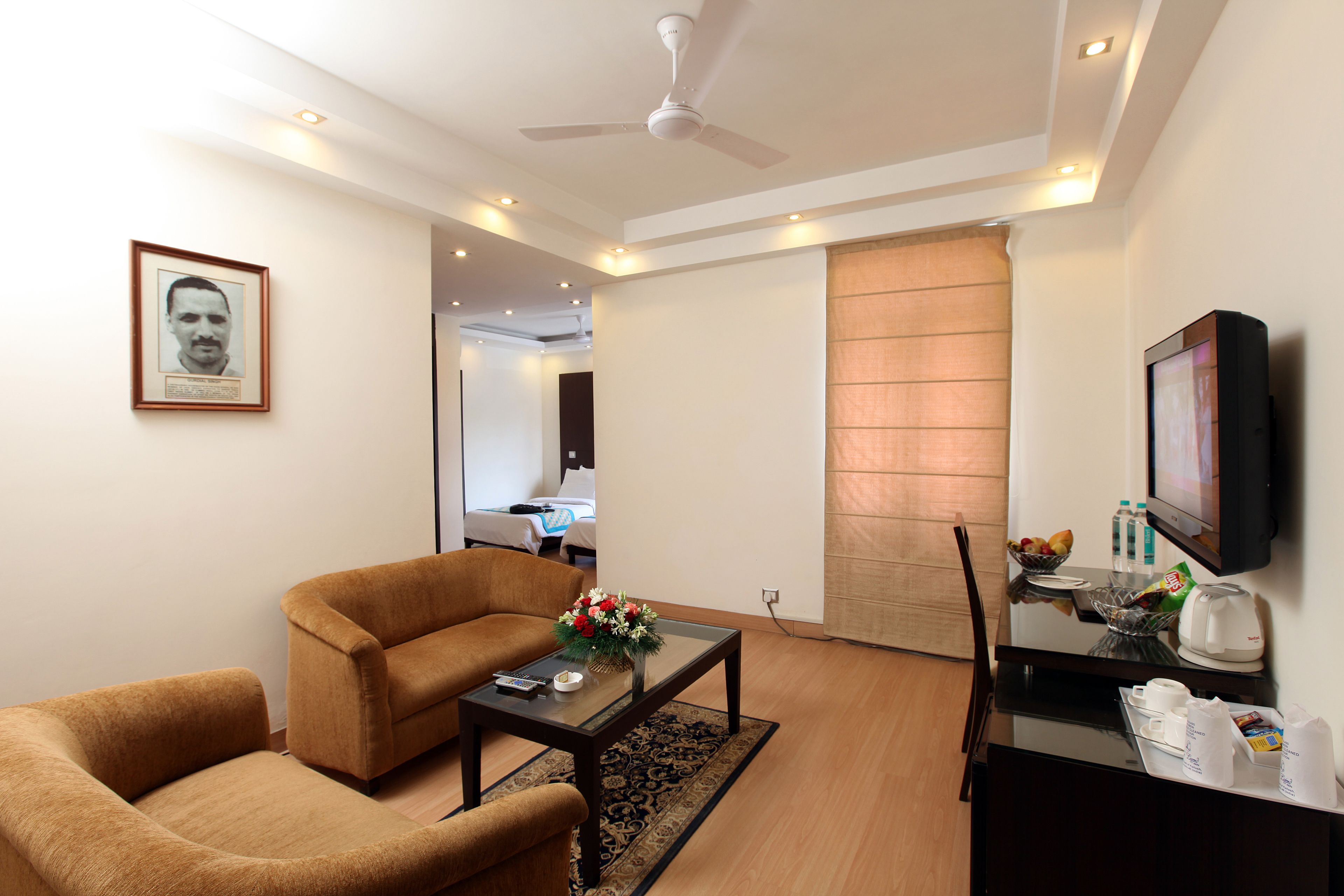Suite | Living area | 42-inch LCD TV with cable channels, TV