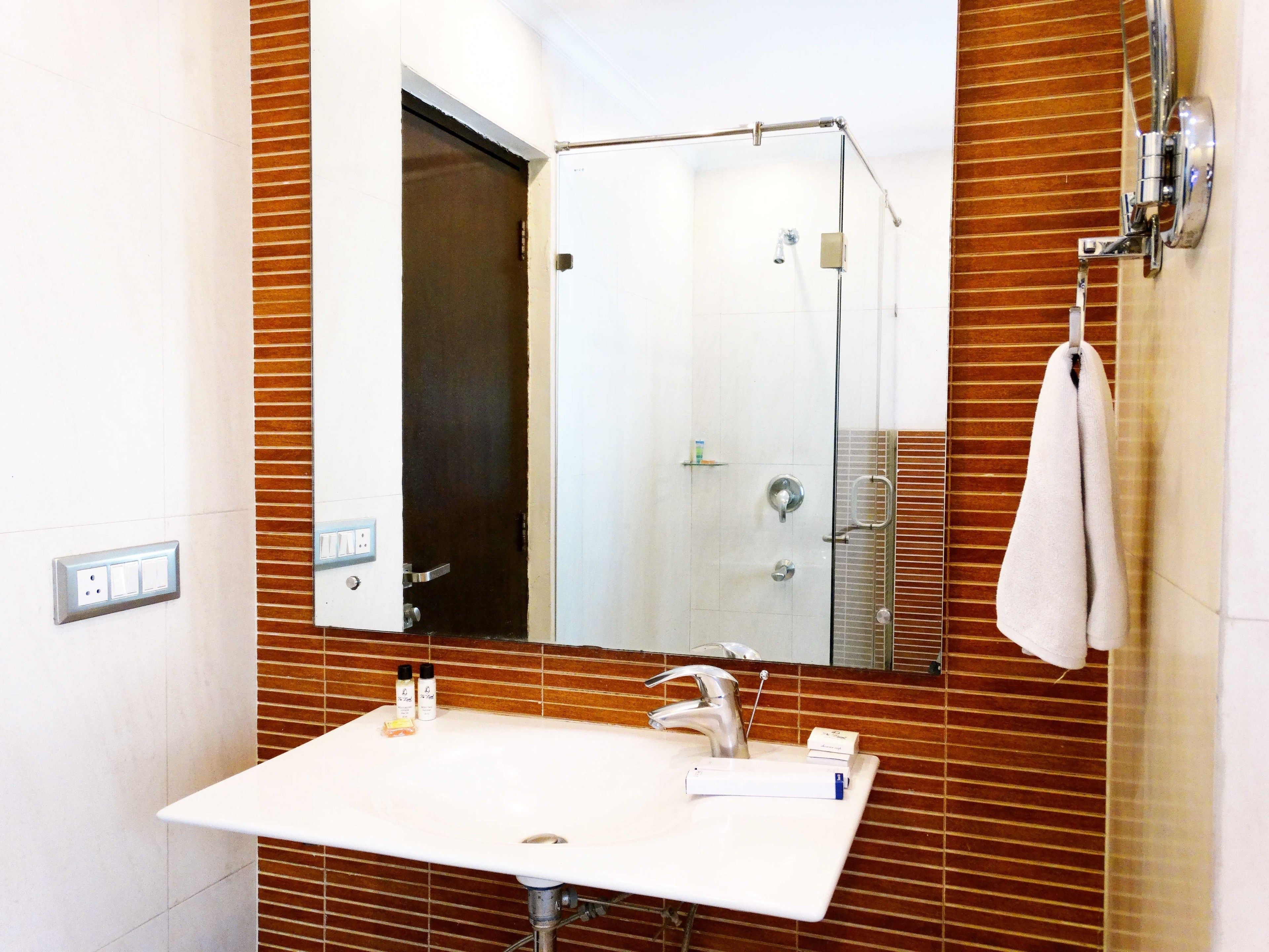 shower, free toiletries, hair dryer, slippers