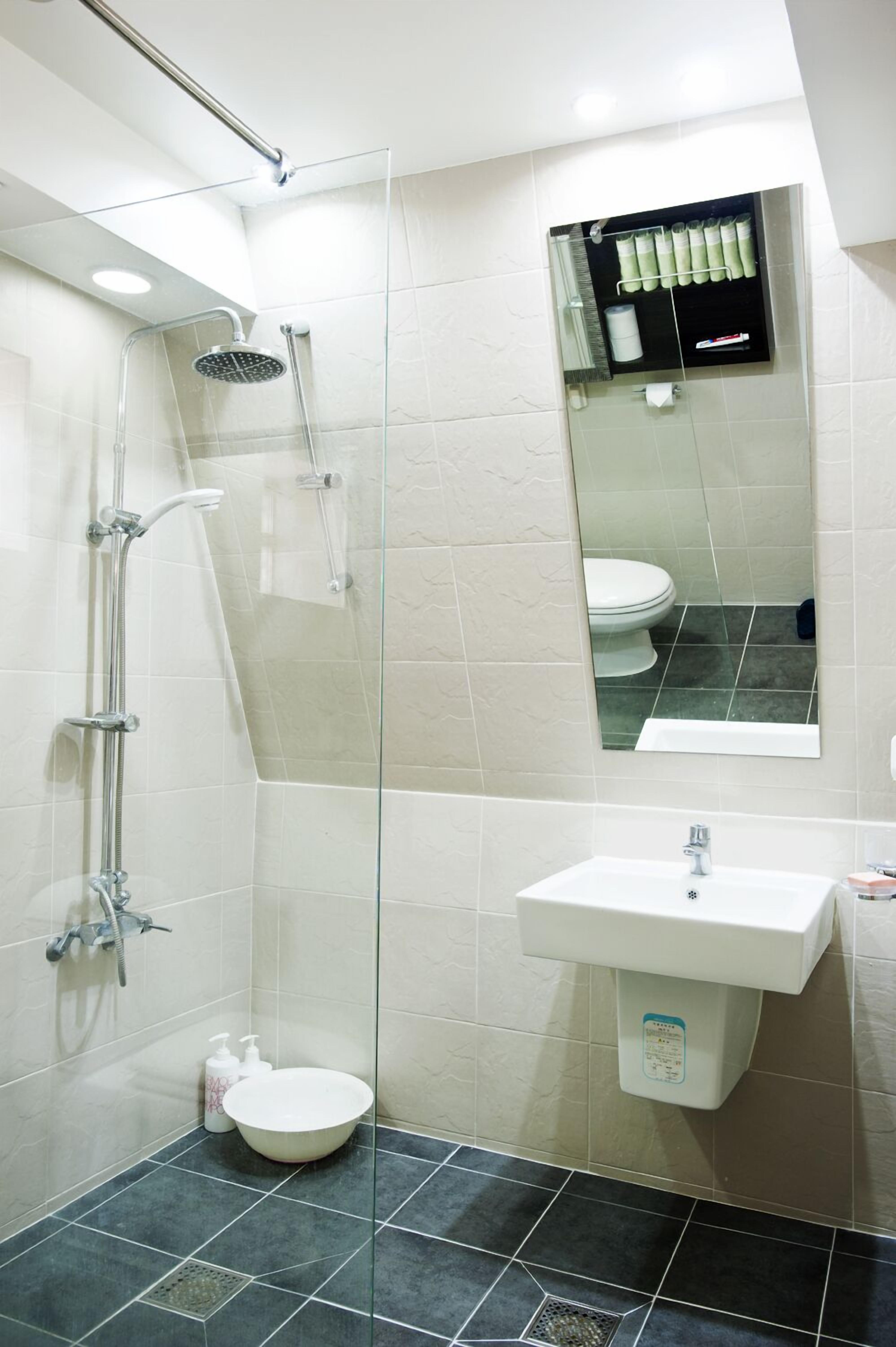 Family Room | Bathroom | Shower, hair dryer, slippers, towels