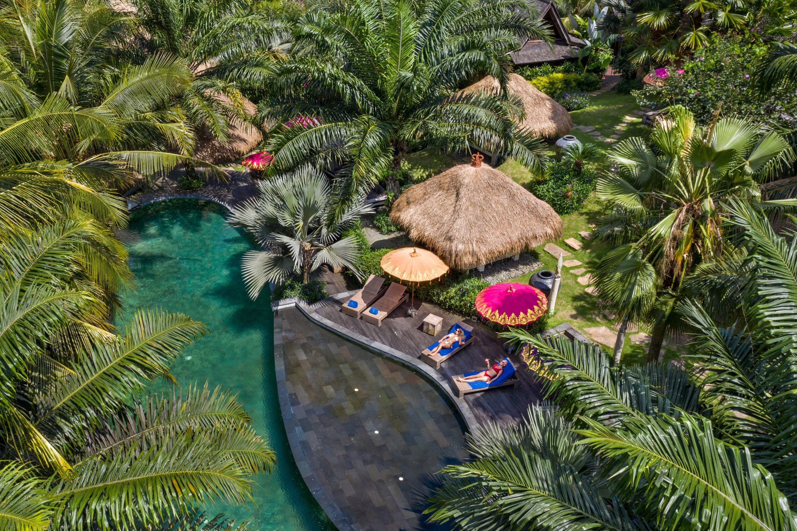 outdoor pool, open 7:00 am to 7:00 pm, pool umbrellas, pool loungers