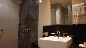 Junior Suite Non View | Bathroom | Shower, hair dryer, slippers, towels