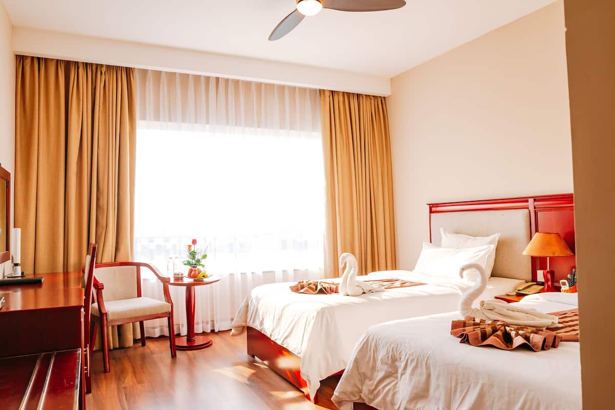 Superior Room, City View | Minibar, in-room safe, desk, rollaway beds
