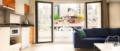 Premium Penthouse, 1 Bedroom, Sea View | Living area | LCD TV, DVD player