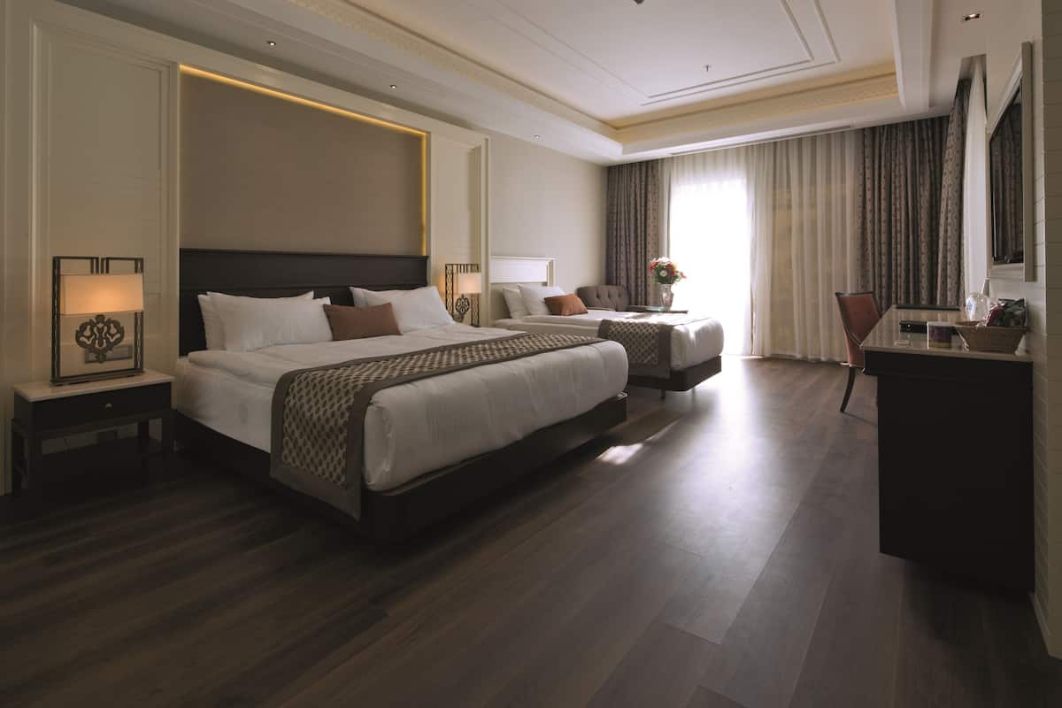 Deluxe Pool Family Room  | Minibar (free items), in-room safe, cribs (free), WiFi (free)