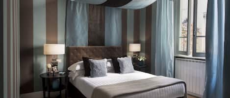 Deluxe suite, 2 slaapkamers | 1 slaapkamer, luxe beddengoed, donzen dekbedden
