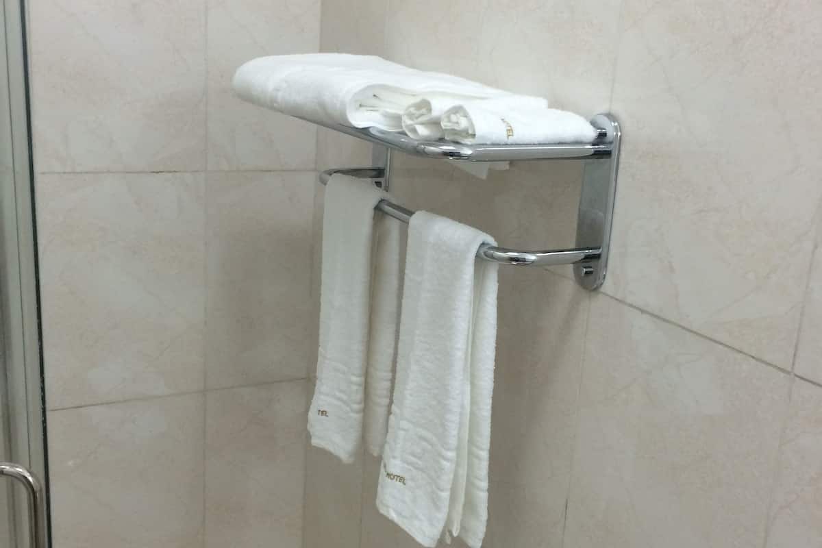 basic double room, 1 king bed | bathroom amenities | free toiletries, hair dryer, slippers, towels