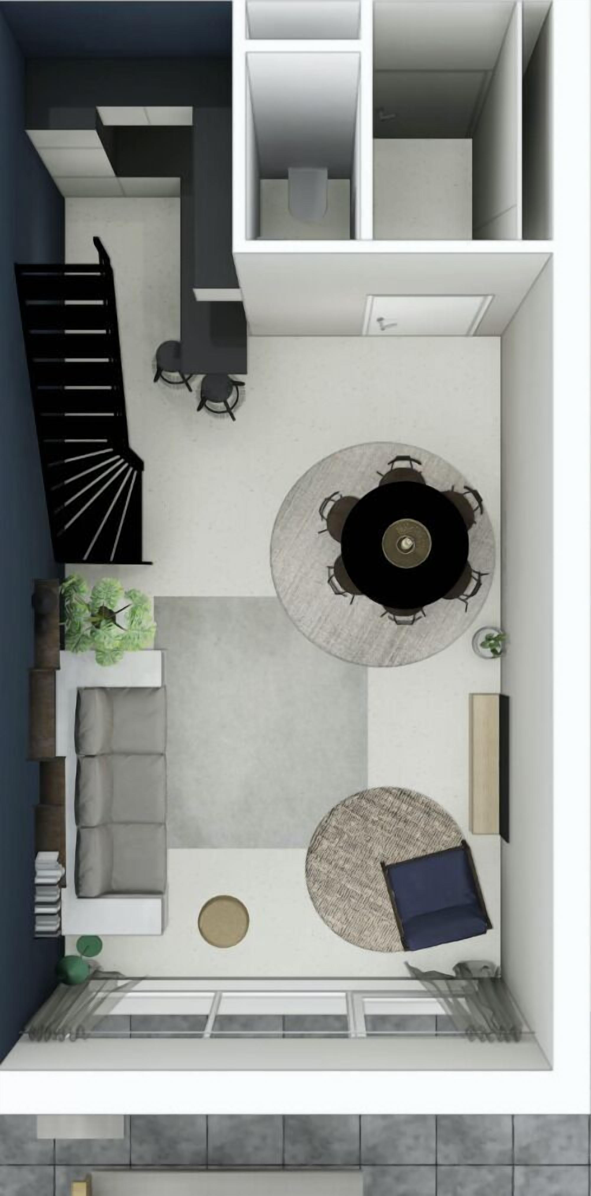 Um interior moderno com área de refeições, sofá e escada.
