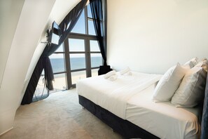 Penthouse The Beach | Ropa de cama de alta calidad y caja de seguridad en la habitación 