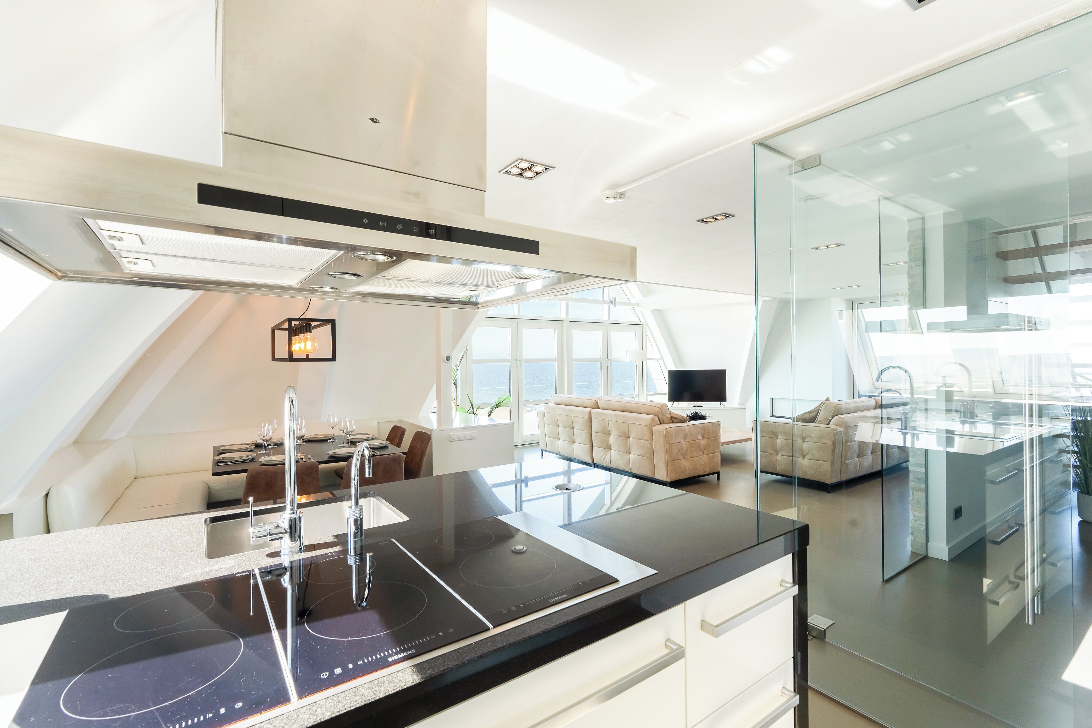 Penthouse The Beach | Private kitchen | Full-size fridge, microwave, oven, stovetop