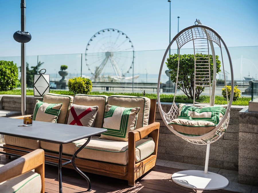 Breakfast, lunch served; international cuisine, al fresco dining