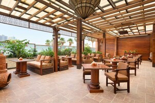 Breakfast, lunch, dinner served; local cuisine 