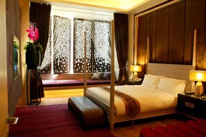 Premium bedding, down comforters, free minibar, rollaway beds