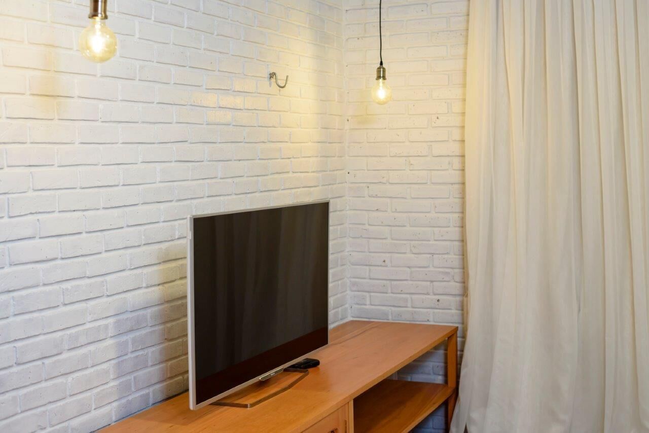 executive room - first floor | minibar, desk, blackout curtains, iron/ironing board