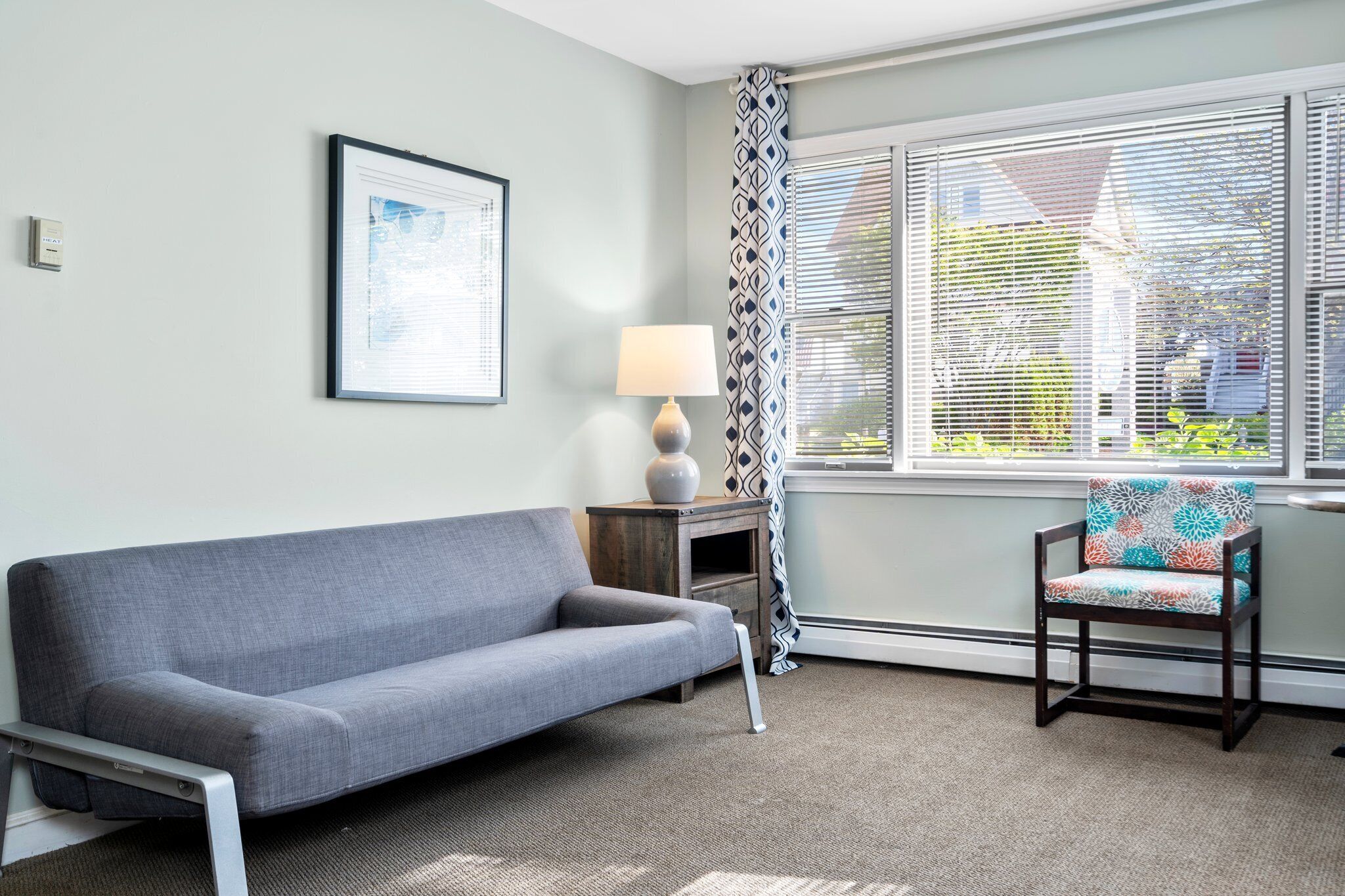 deluxe king room 1 bed | living area | 32-inch flat-screen tv with cable channels, tv