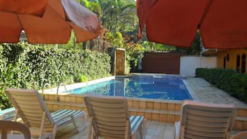 Outdoor pool, pool umbrellas, pool loungers