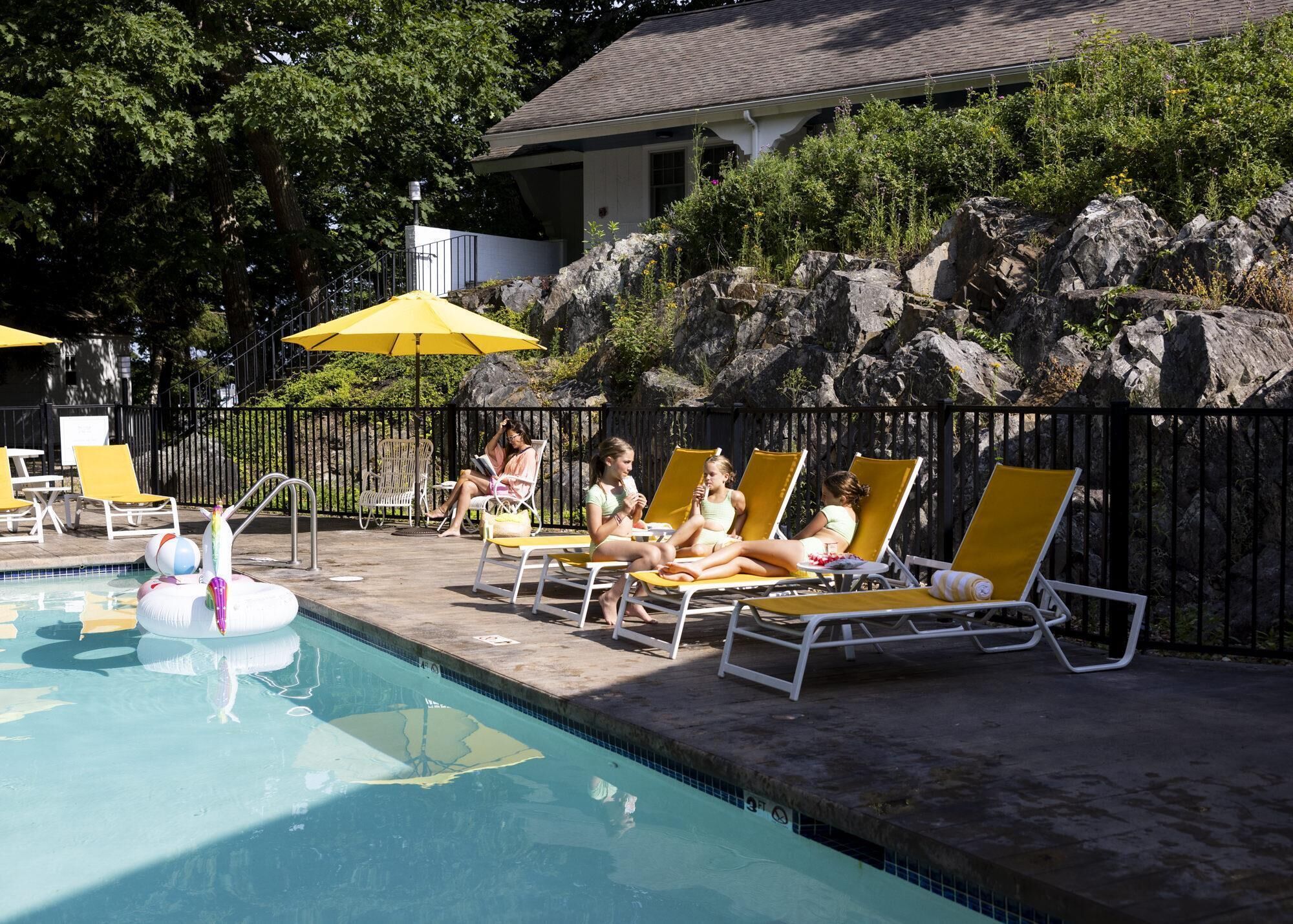Seasonal outdoor pool, pool umbrellas