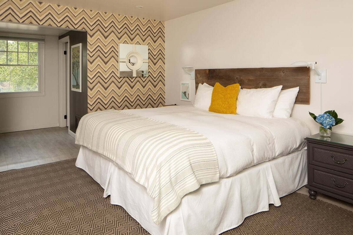 Cove King Second Floor | Individually decorated, individually furnished, iron/ironing board