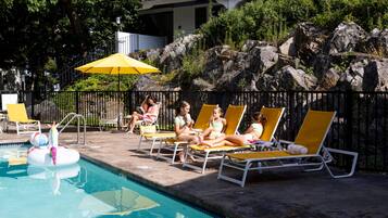 Seasonal outdoor pool, pool umbrellas