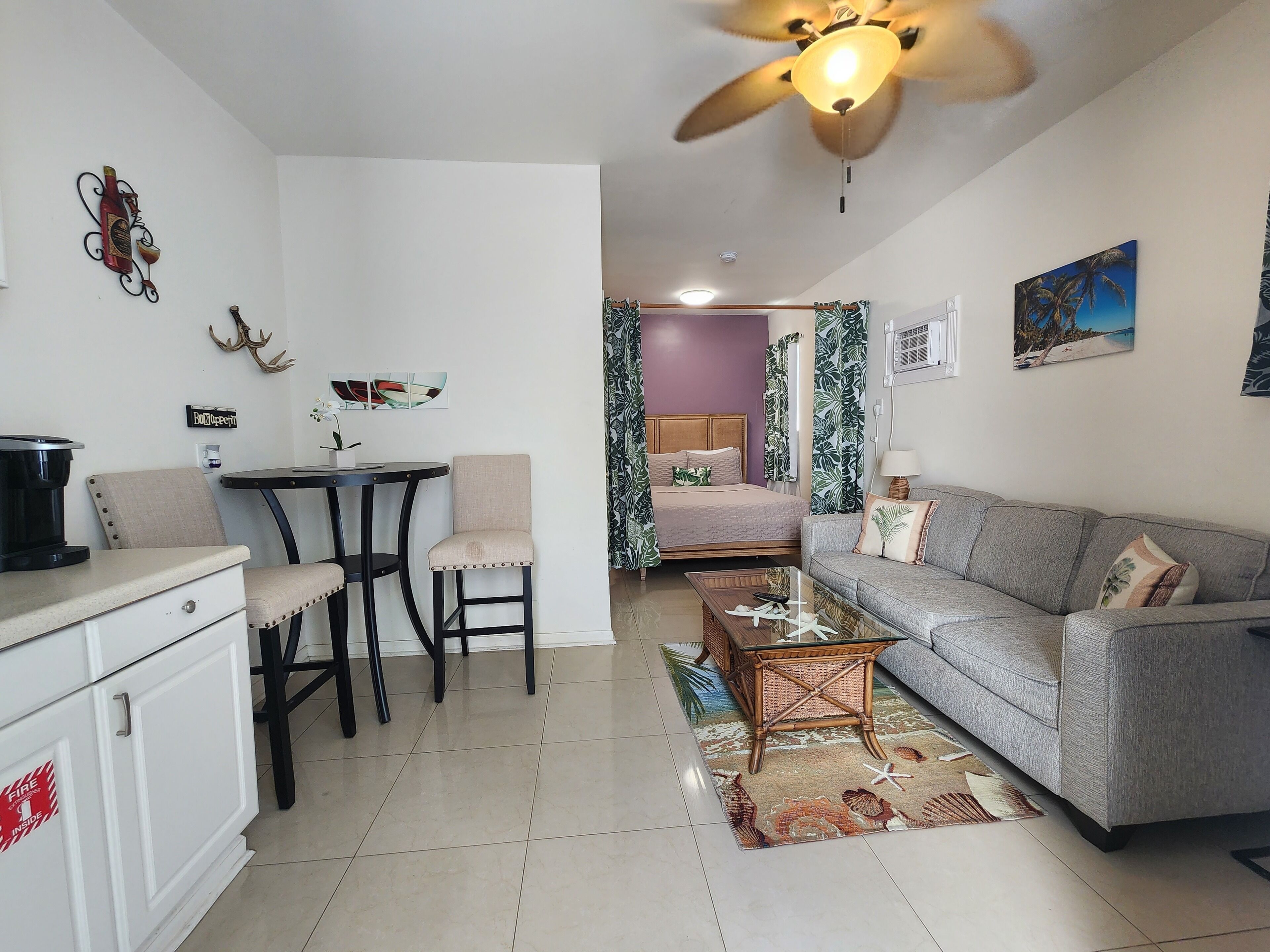 old town queen studio  | living area | flat-screen tv