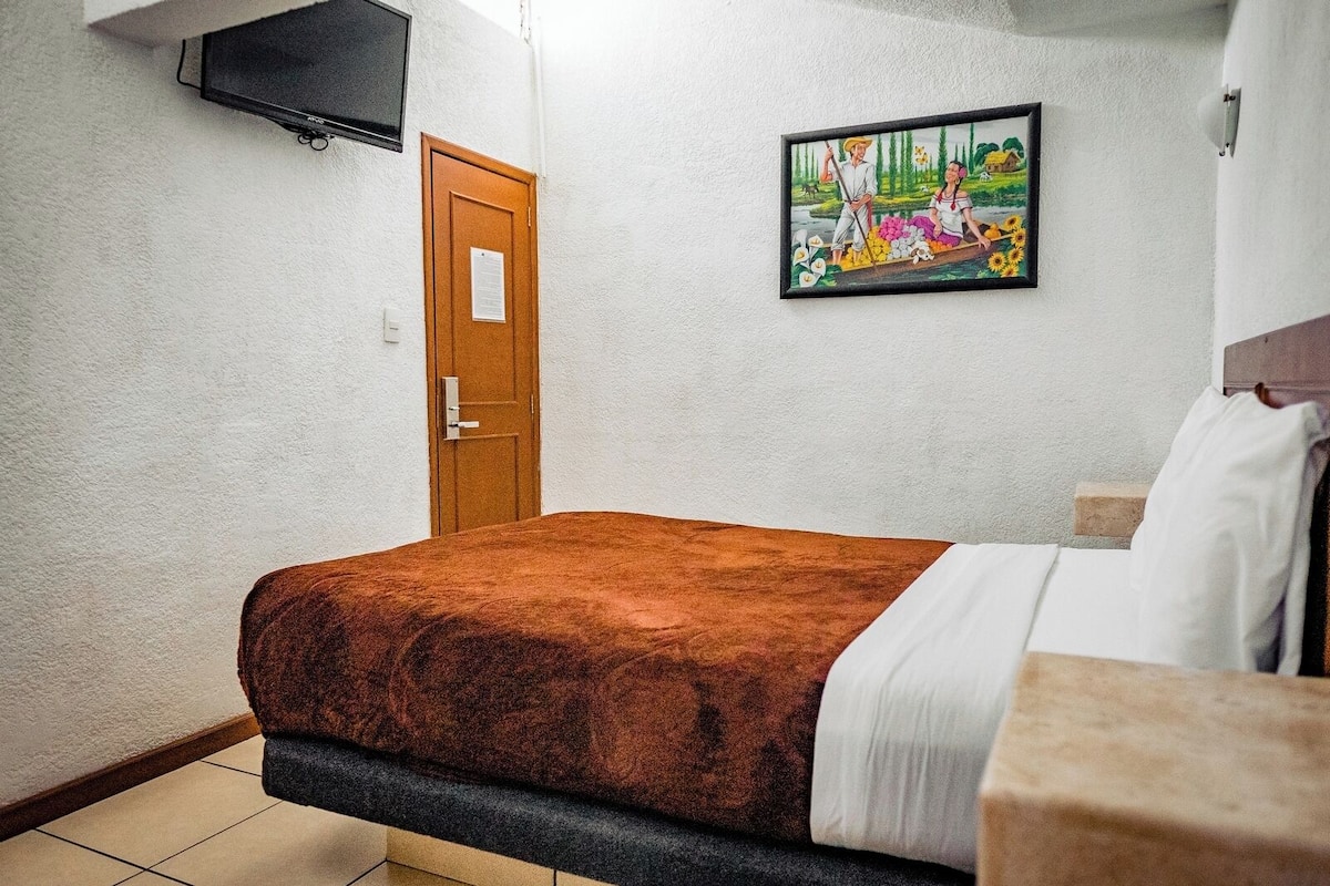 Comfort Suite, 1 Queen Bed, Sauna | 1 bedroom, in-room safe, free WiFi, bed sheets