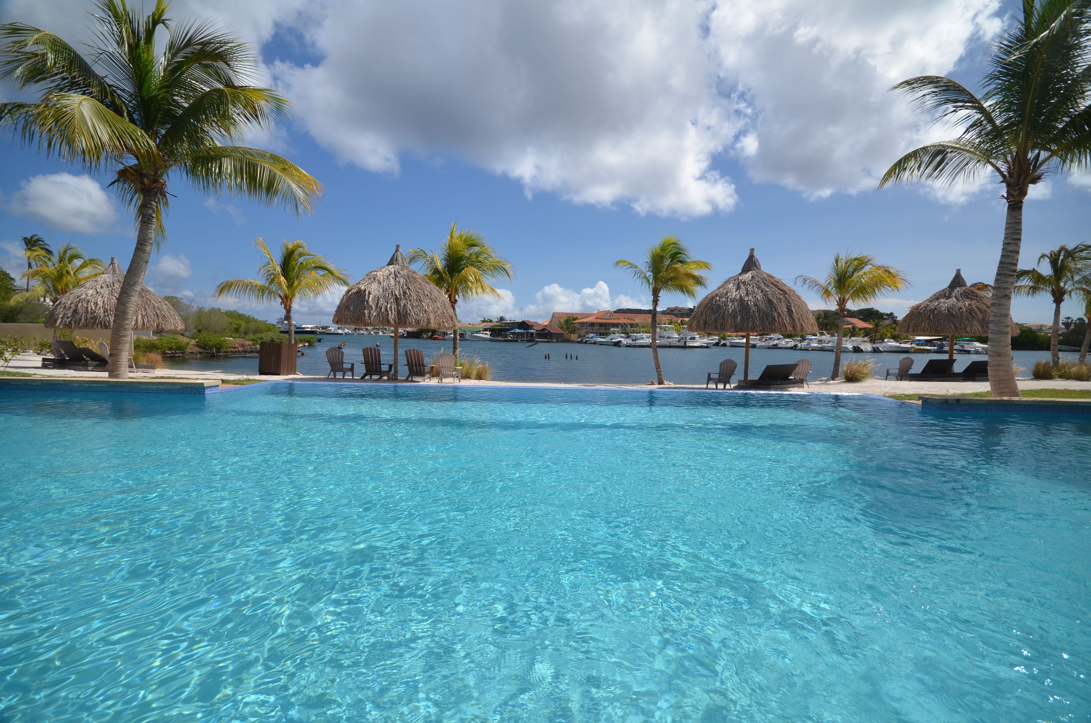 2 outdoor pools, pool umbrellas, pool loungers