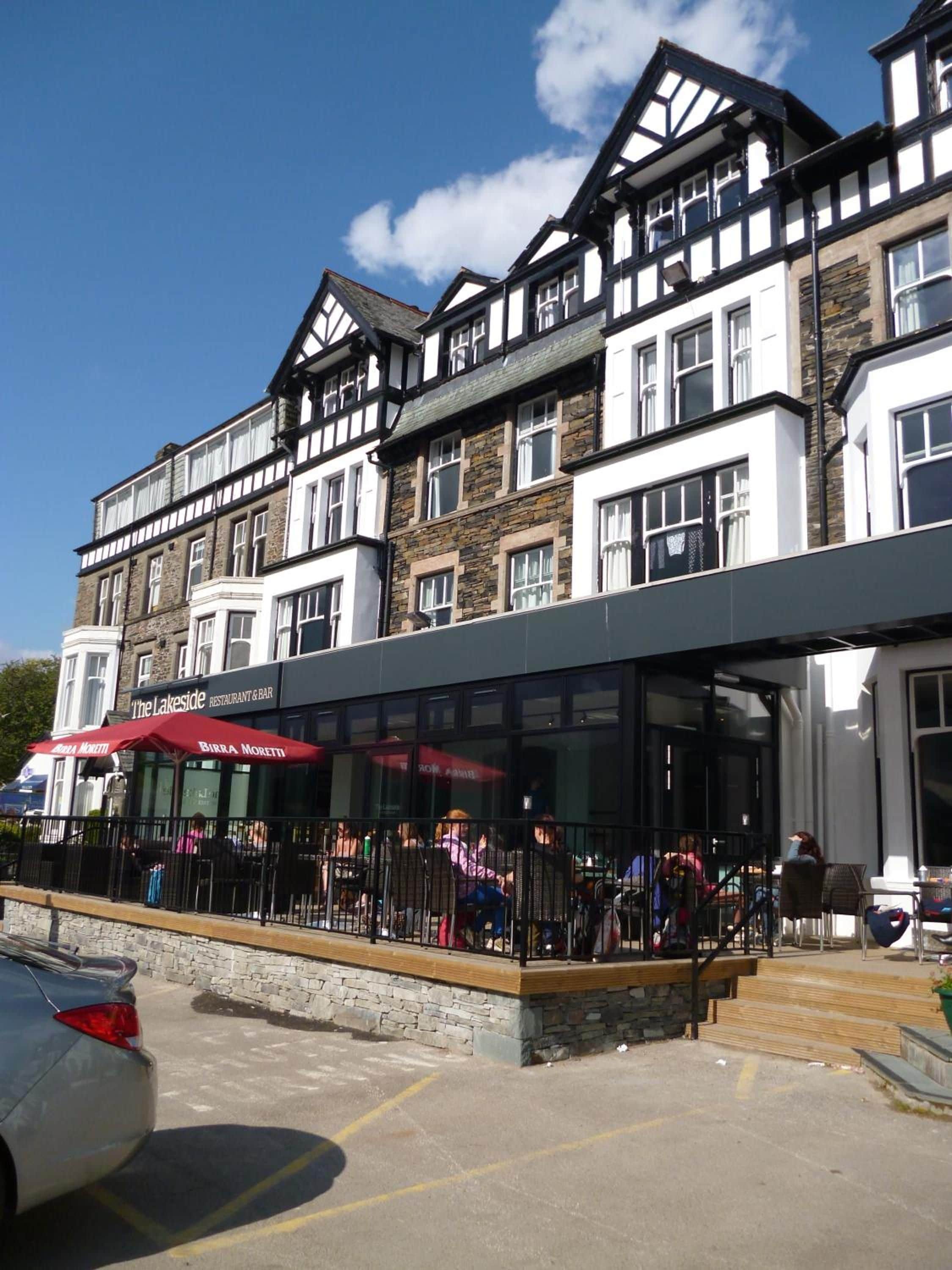A building with a restaurant and bar named 'The Lakeside' on the ground floor.