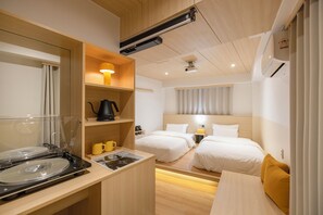 Habitación con 2 camas individuales | Caja de seguridad en la habitación, insonorización y wifi gratis 