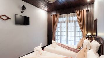 Deluxe Twin Room, River View | In-room safe, desk, iron/ironing board, free WiFi