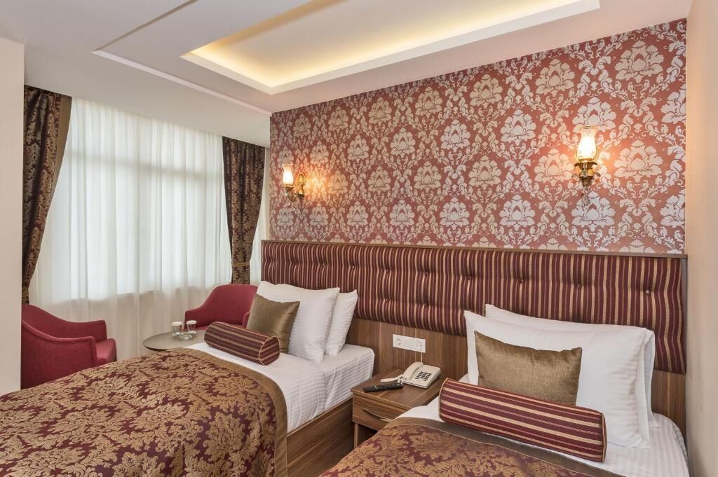 Luxe beddengoed, een minibar, een kluis op de kamer, een bureau