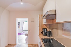 Coffres-forts dans les chambres, bureau, fer et planche à repasser