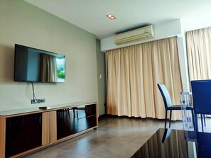 Suite, Kitchenette, City View | Living area | 53-inch Smart TV with cable channels - 14 Living (Bangkok)